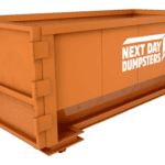 A bright orange dumpster from Next Day Dumpsters