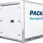 A large white metal storage contain with Pack-Rat logo.