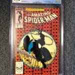A copy of Amazing Spider-Man No. 300 enclosed in a hard plastic case and professionally graded. 