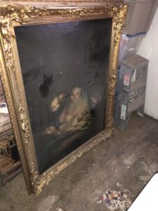 Antique oil on canvas painting of Madonna and Child in a gilded frame.