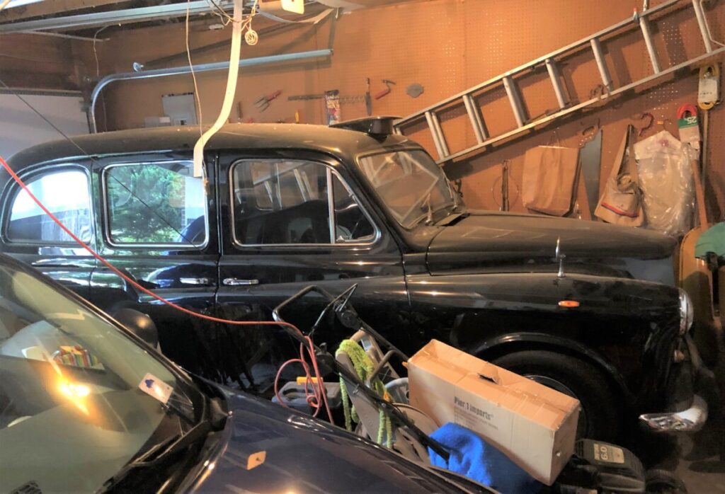 We found a British taxi sitting in a mound of junk in Columbia, Maryland.