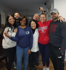 Our multiracial family poses for a goofy photo.